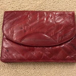 Lee Sands burgundy 100% eel skin clutch